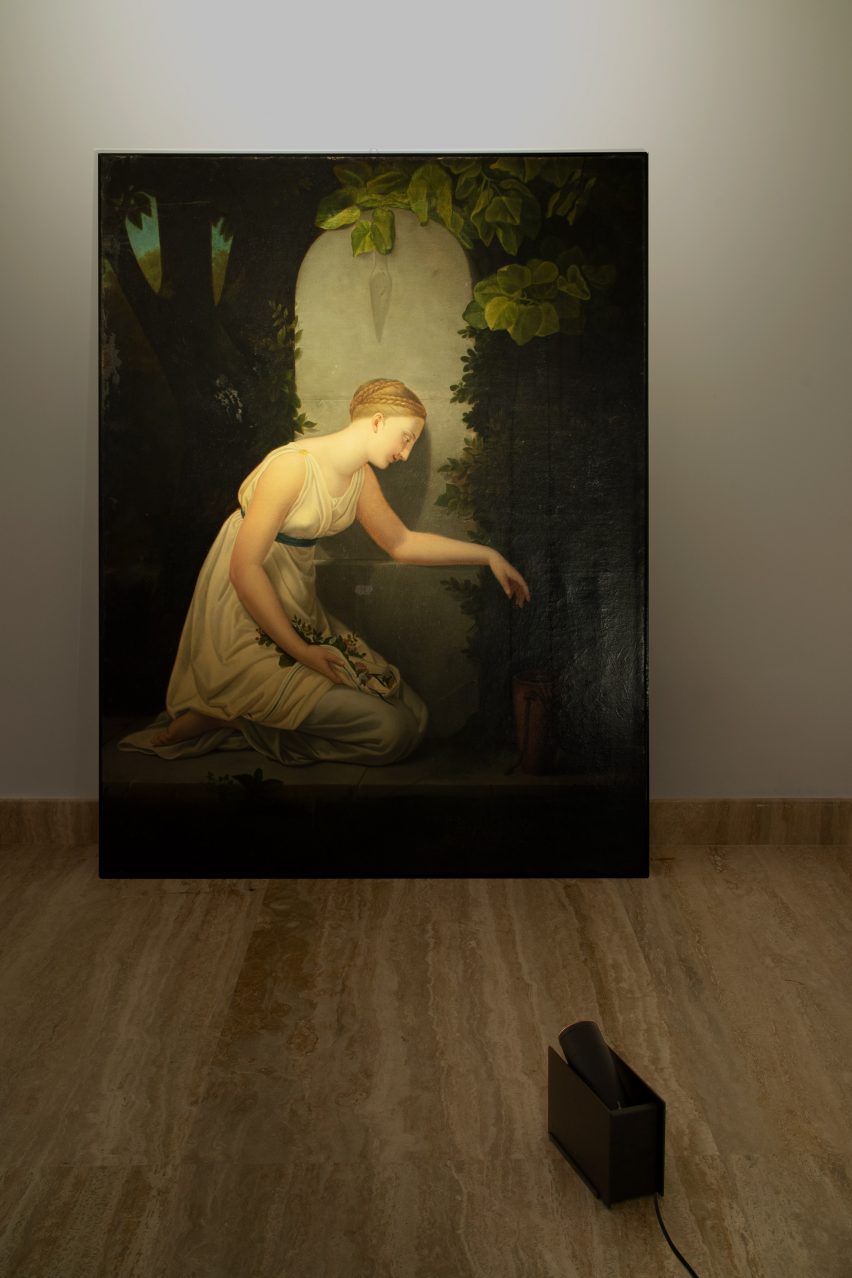 Plint light by Massimo Colagrande for Nemo Lighting illuminating a painting
