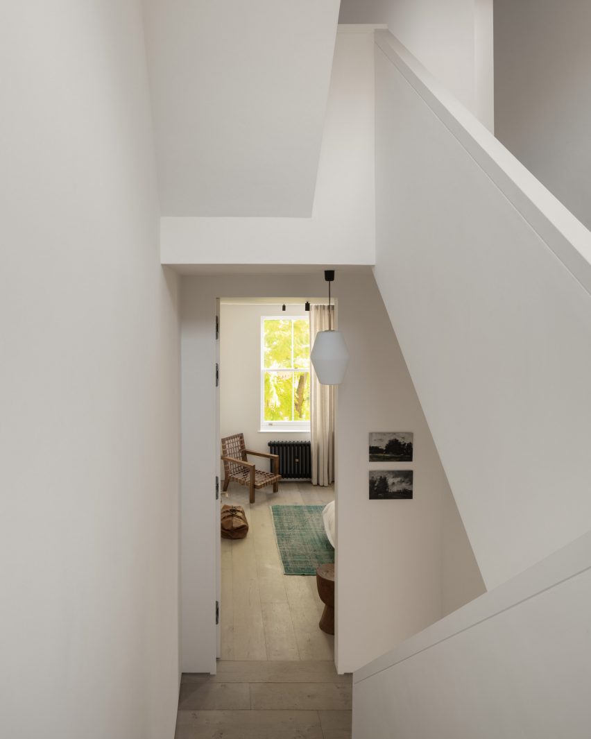 White-walled interiors of AC Residence
