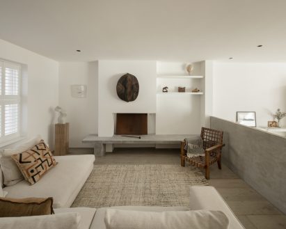 The pared-back living room of AC Residence