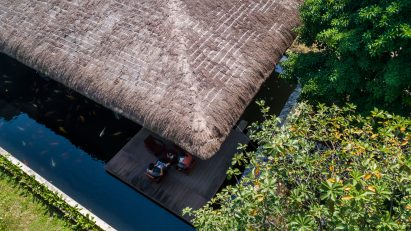 A holiday home with a thatched roof