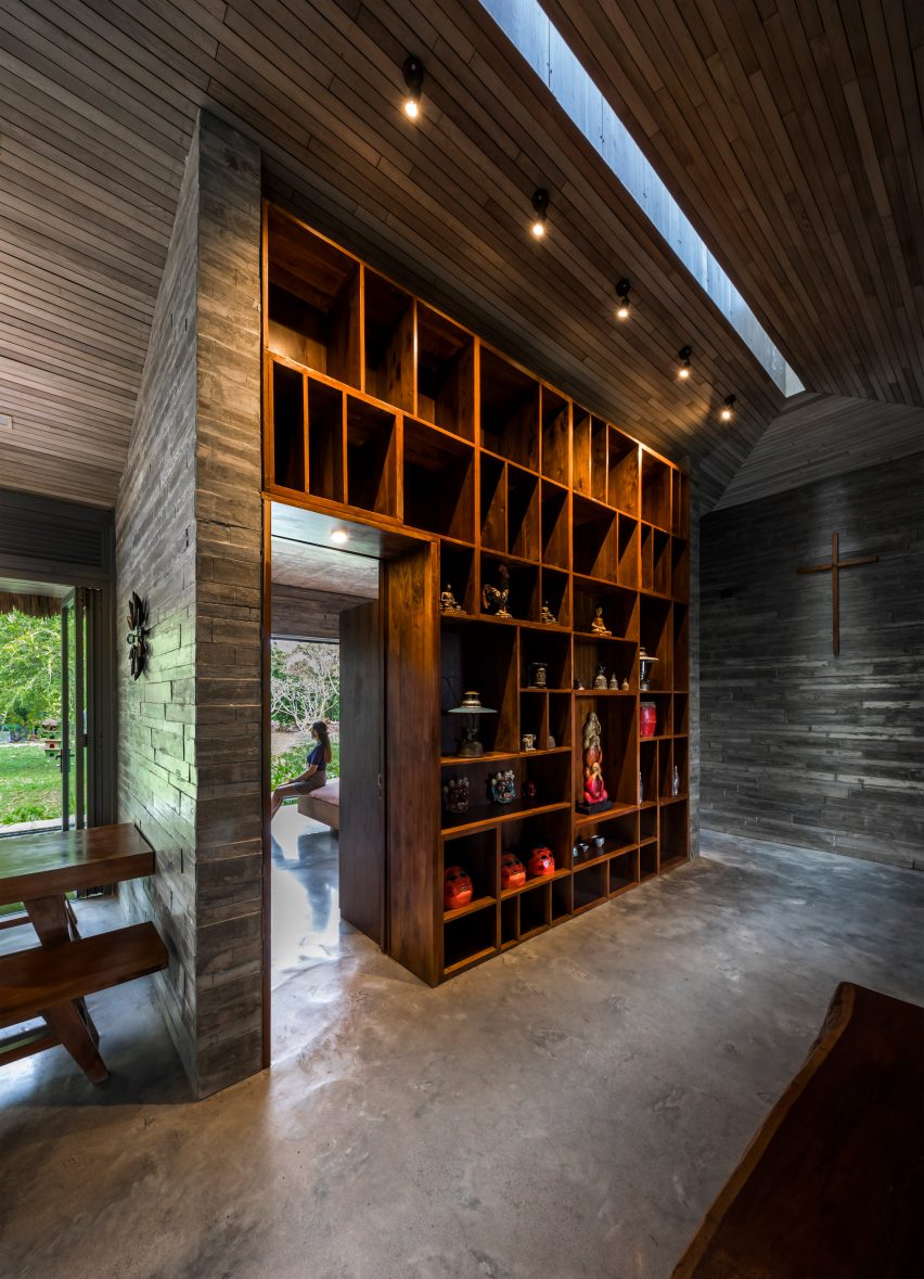 Concrete interiors with a large bookcase