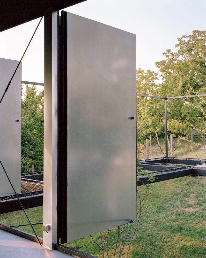 Pivoting steel doors