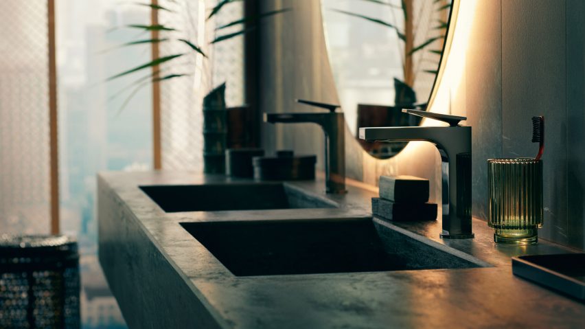 A dark bathroom featuring Axor taps