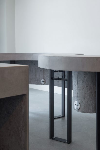Curving concrete counters in Vancouver oyster bar