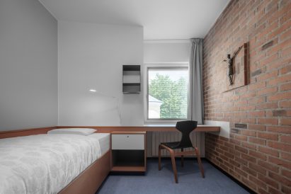 Bedroom in Cusanus Academy renovation by MoDus Architects