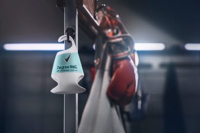 Deodorant packaging for people with disabilities by Unilever on a changing room hook