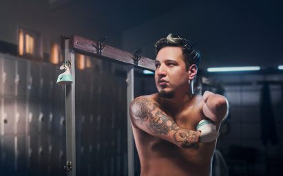 Degree Inclusive deodorant being used by a boxer with disabilities