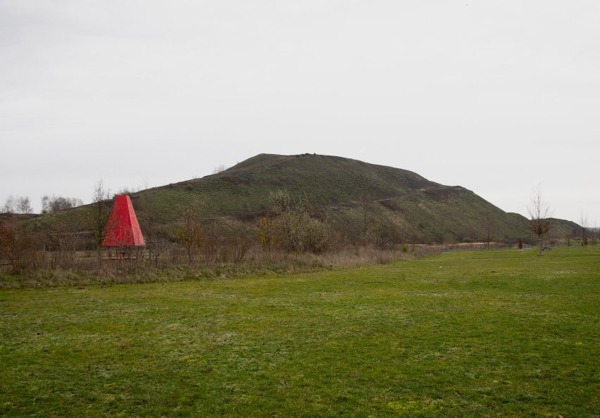 A park with a bright red pavilion