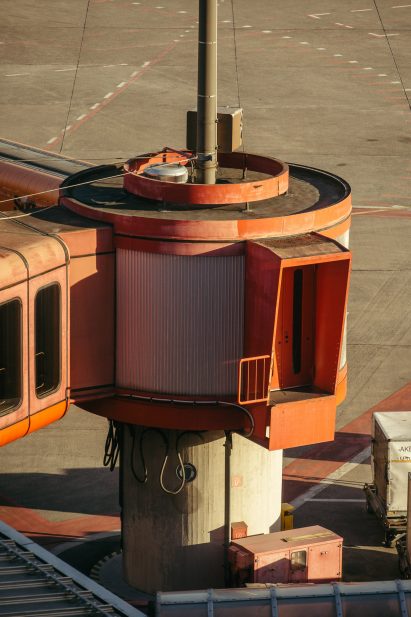 Red boarding bridge photographed by Robert Rieger and Felix Brüggemann