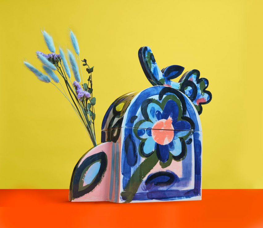 Cremation urn on yellow background