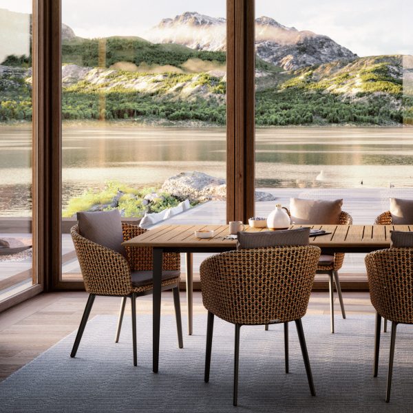 Chairs in dining room with mountain view