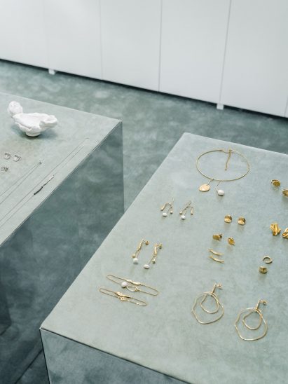 Seafoam green displays in Moscow store interior by Elena Lokastova