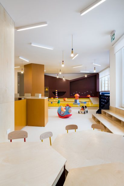 Stepped play area with nook in the wall in Malvína Day Nursery