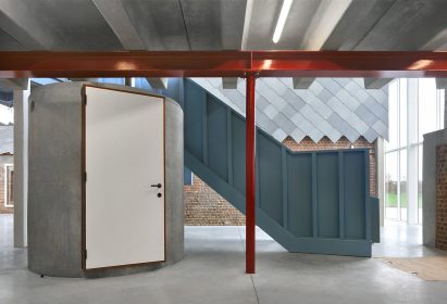 Red steel structure and a blue staircase