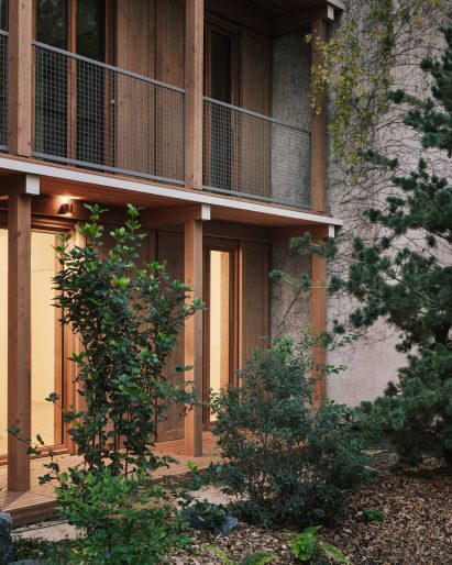 Shutters on wooden apartment block