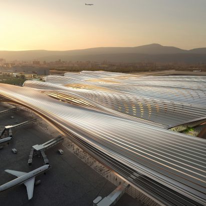 The terminal has a sweeping roof by Rogers Stirk Harbour + Partners