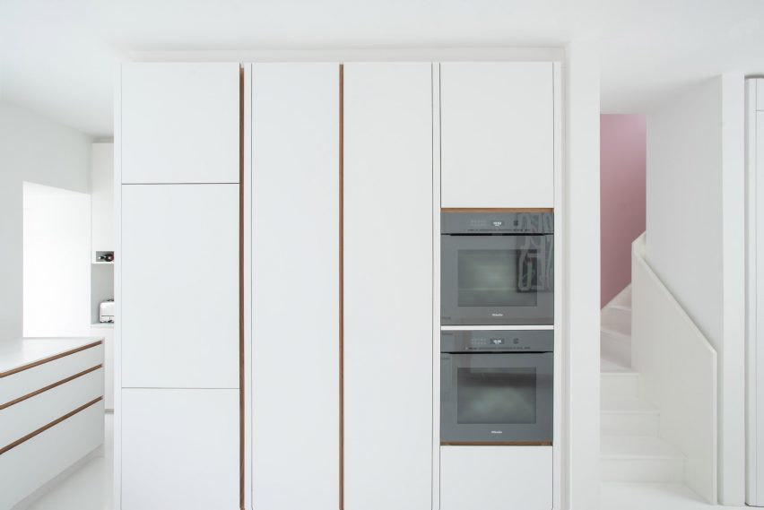 Cabinetry conceals storage