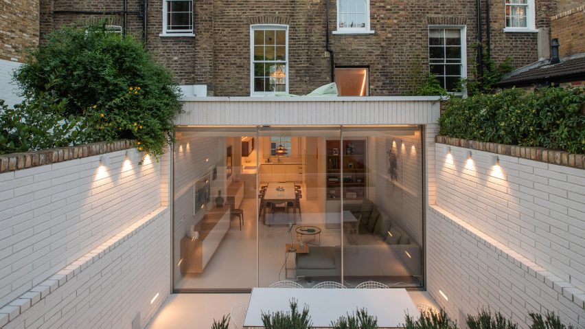Moxon Architects remodels Victorian terrace with sunken garden and minimalist interiors