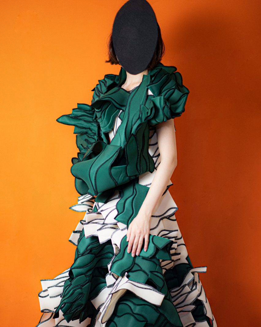 Green and white garment