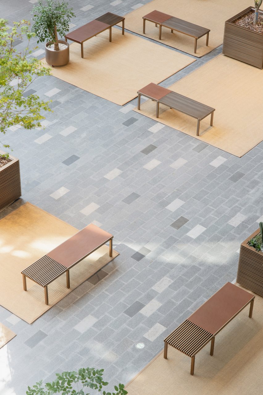 Benches in Xintiandi atrium by AIM Architecture