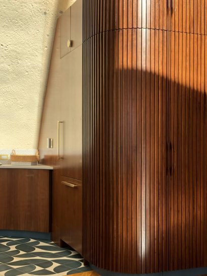 Fluted wood on custom cabinetry of Shell House 