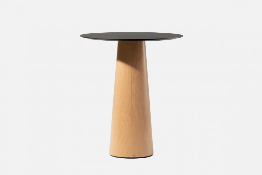 Small plywood table with a black top