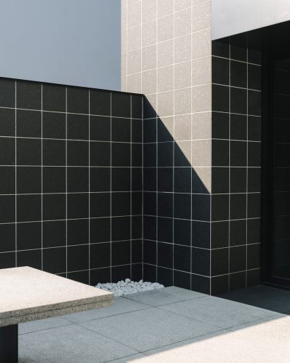 Gridded exterior and courtyard of Soulwax studio