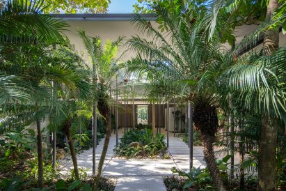 The Sirena House is surrounded by local vegetation