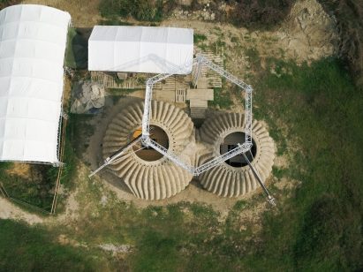 It was constructed using a 3D-printer with two arms by Mario Cucinella Architects and Wasp