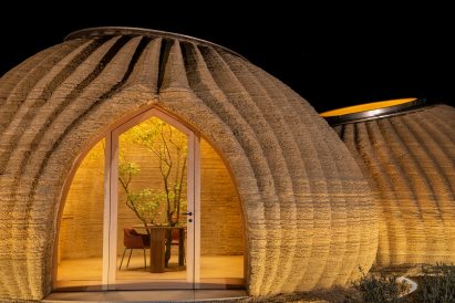It has a glass entrance door by Mario Cucinella Architects and Wasp