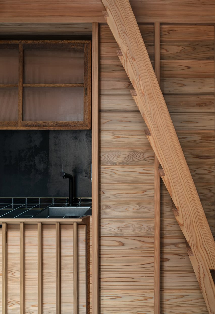 A kitchen with cedar detailing