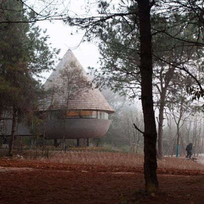 A guesthouse with a conical roof