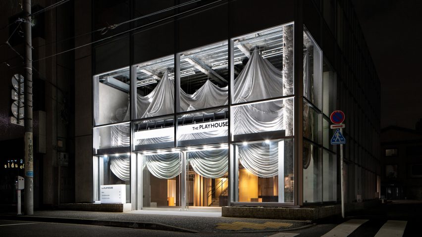 A curtain covers the interior of The Playhouse