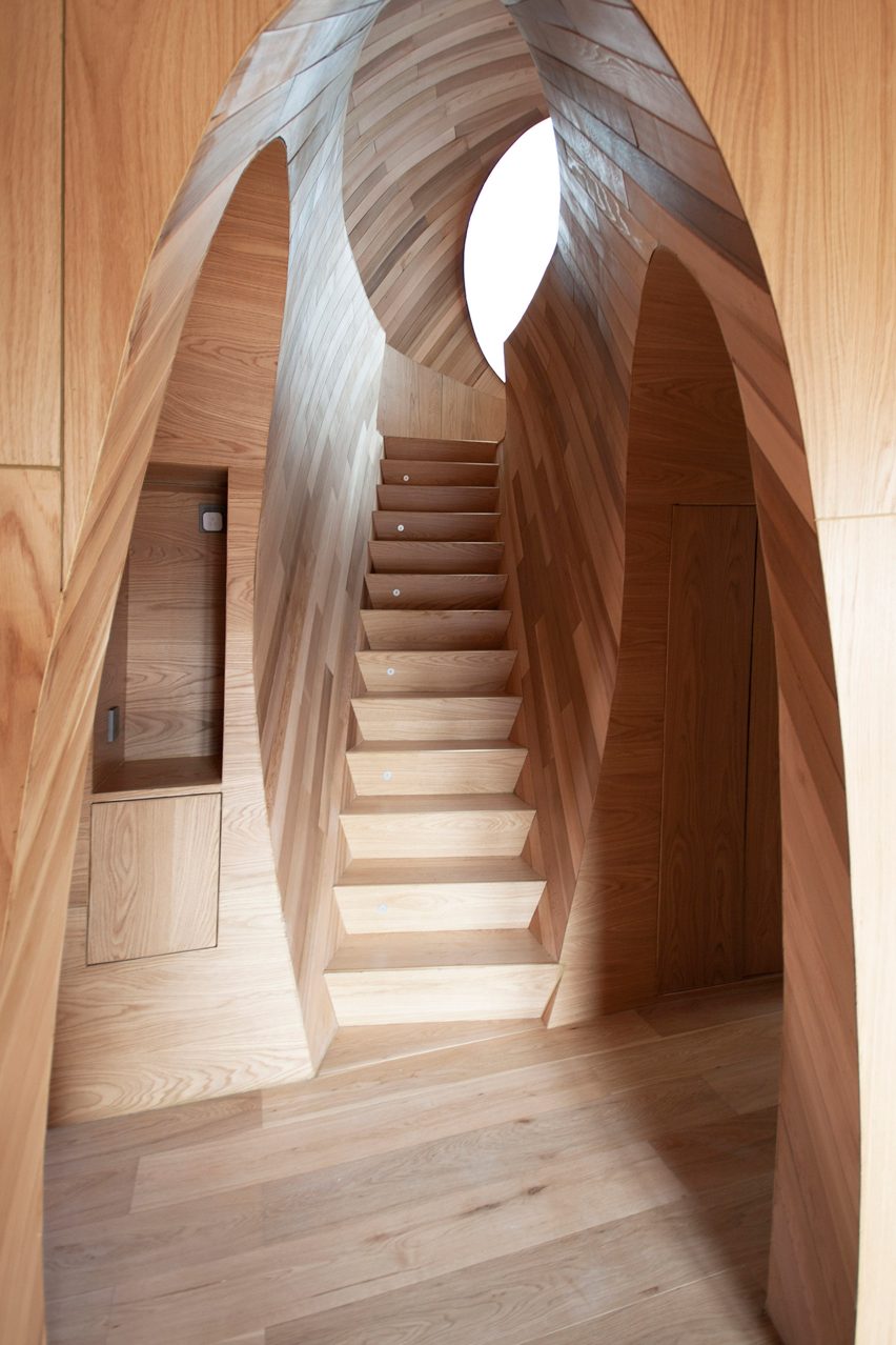 A wooden staircase and hallway
