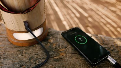WaterLight by E-Dina and Wunderman Thompson being used to charge a mobile phone