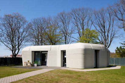 The shape of the 3D-printed home was informed by a boulder