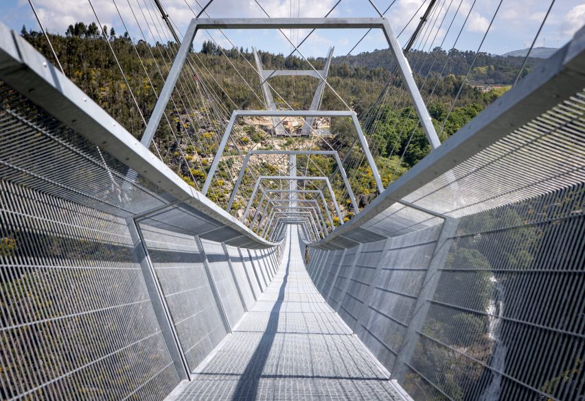 The bridge has gridded walkways