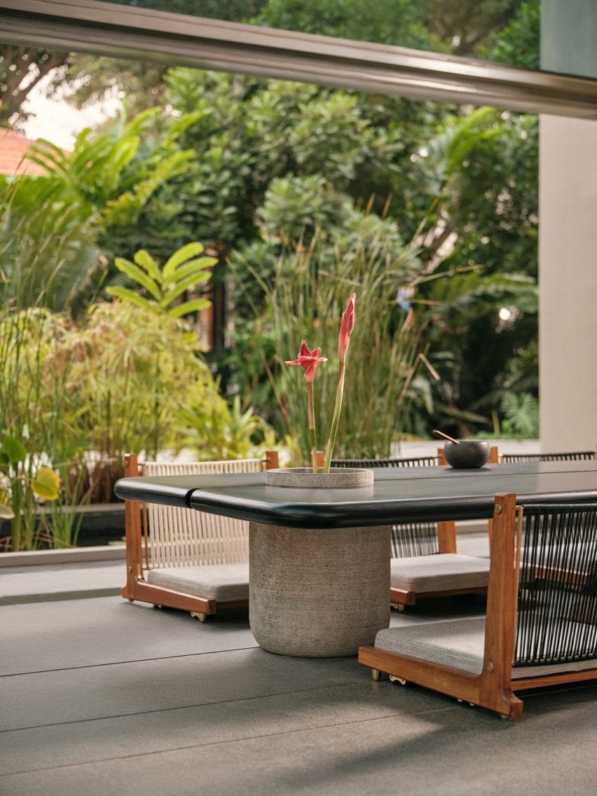 Aayutha low dining table with Kelir chairs by Magari