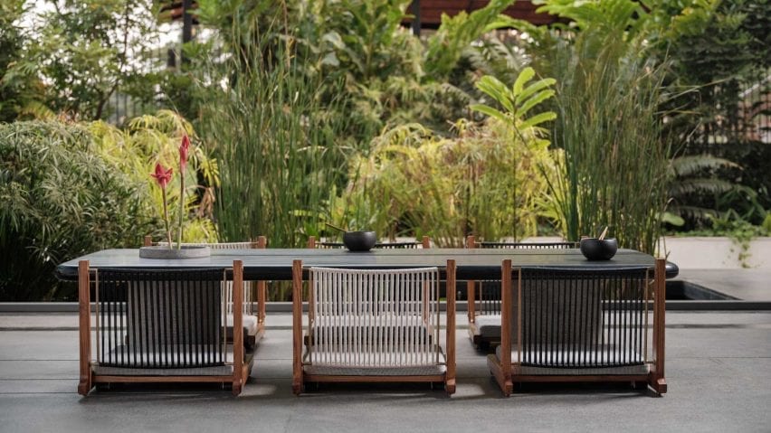 Aayutha low dining table with Kelir chairs by Magari