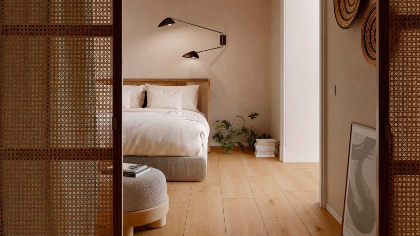 Blush-pink bedroom with tiled timber-like floor