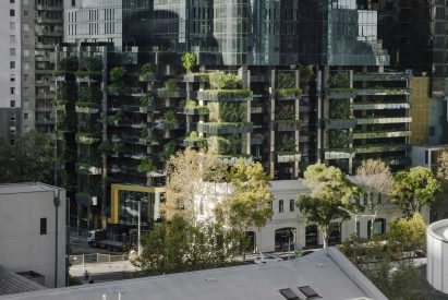It has a stacked green envelope on its ground level by Fender Katsalidis