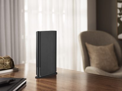 The Beosound Emerge on a table top in a living space