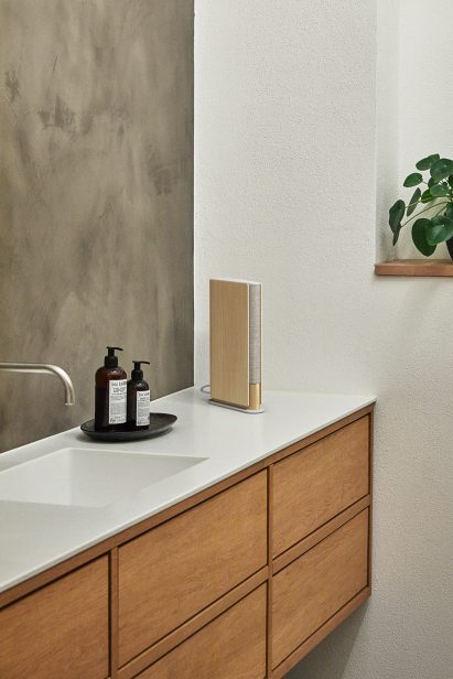 The speaker has a slim book-like design 