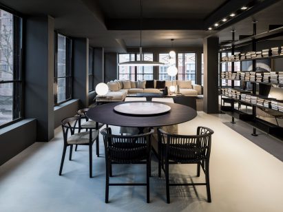 Dining table and screen partition in a London showroom