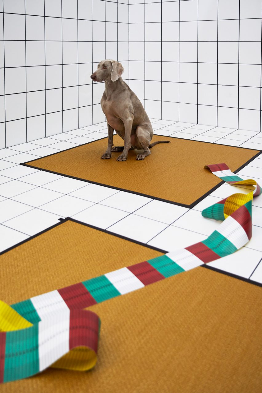 A pair of square mustard-coloured Bolon R rugs