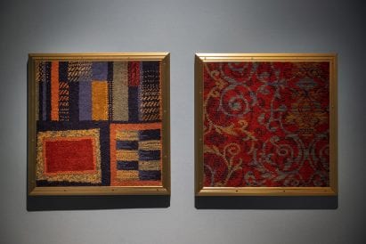 Framed textiles from pub furniture