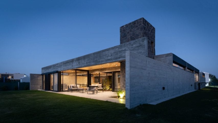Concrete and stone house at dusk