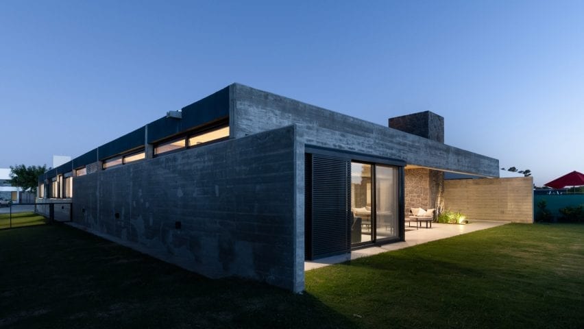 Imposing concrete house at night