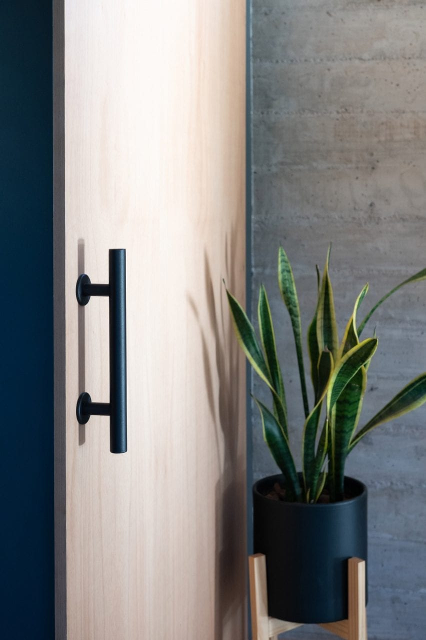 Timber door with black handle