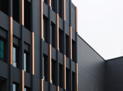 German office office with black and copper cladding